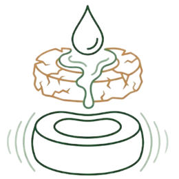 Line art illustration comparing a cracked, dry disc representing tissue distress to a smooth, hydrated disc being replenished by a drop of moisture, representing restored lubrication as one of the key benefits of Ayurvedic treatment for menopause.